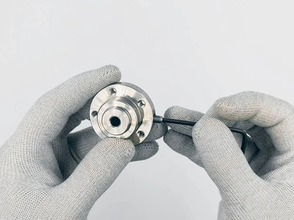Inserting torque screw into shaft adapter